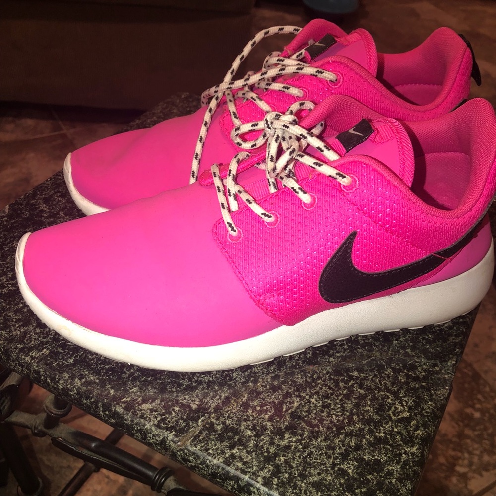 Hot pink Nike Roshe Runs